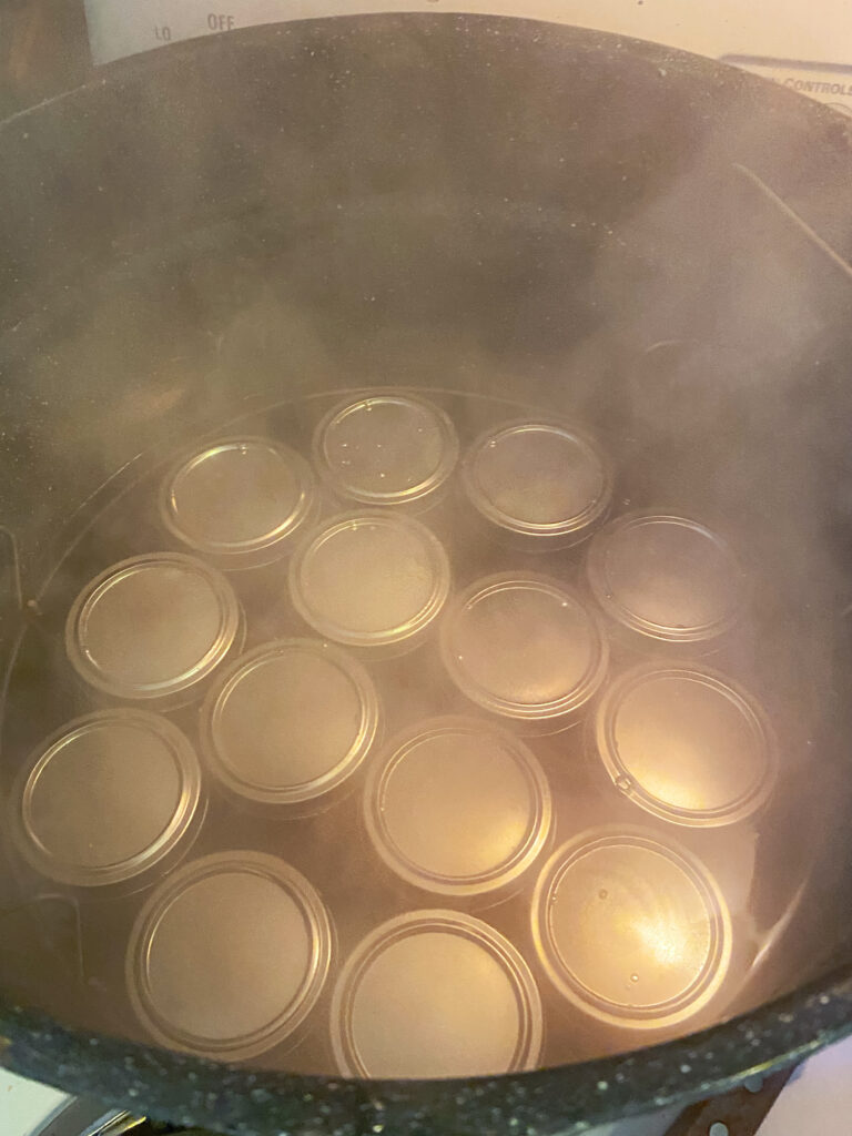 Jars sitting in the hot water canner
